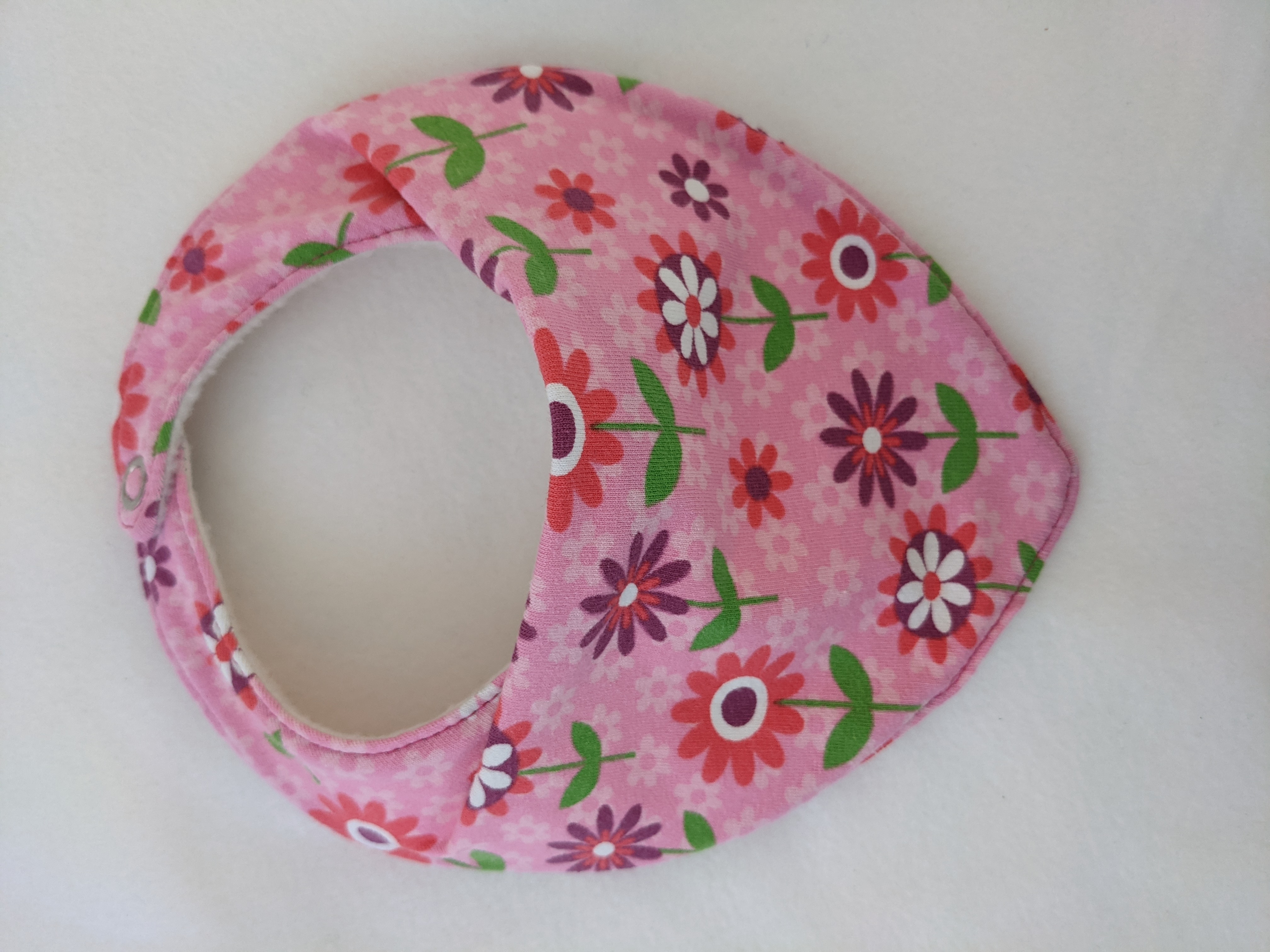 kleines Lätzli Blumen rosa